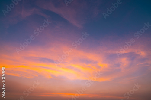 Dramatic orange sky and clouds abstract background. Art picture of orange clouds texture. Beautiful sunset sky. Sunset abstract background. Golden sky in the evening. Calm and relax life.