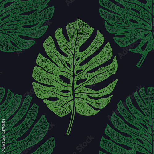 Tropical palm leaves Monstera Green color Seamless pattern Black background