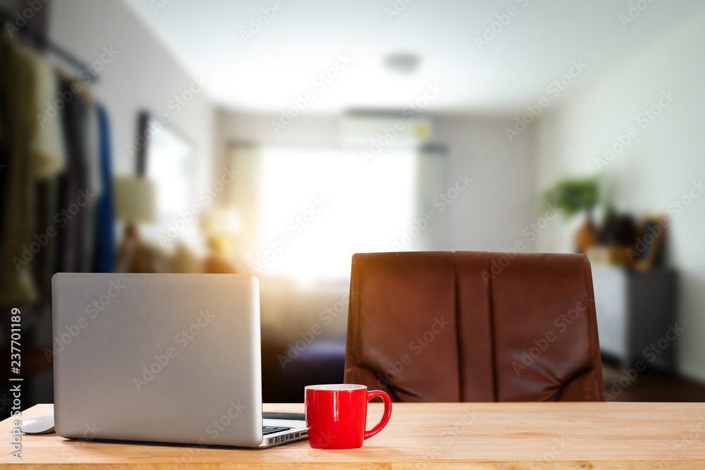 workspace with computer, laptop, office supplies, and coffee cup, smartphone, and tablet at office. desk work concept. in morning light workspace with computer, laptop, office supplies, and coffee cup, smartphone, and tablet at office. desk work concept. in morning light