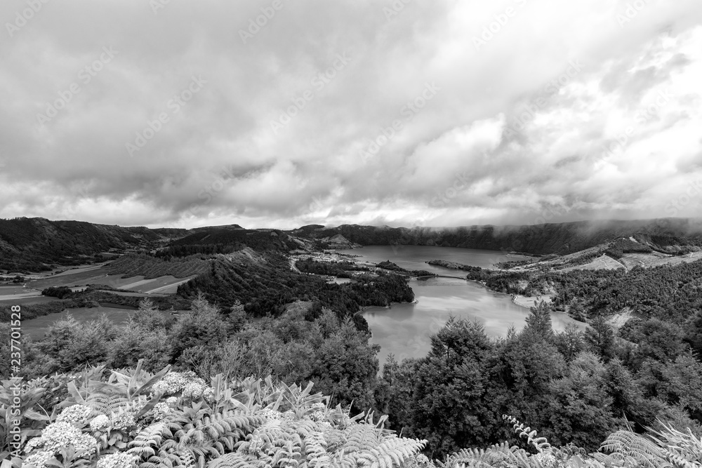 Beautiful black and white view of the massive Sete Cidades crater and village in the Azores.