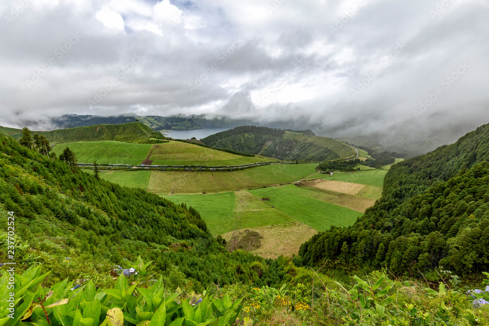 View of calderas and lakes at the edge of the Sete Cidades Caldera on the island of Sao Miguel in the Azores.