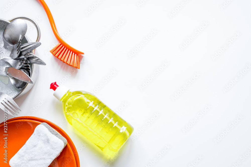 concept of washing dishes on white background top view concept of washing dishes on white background top view