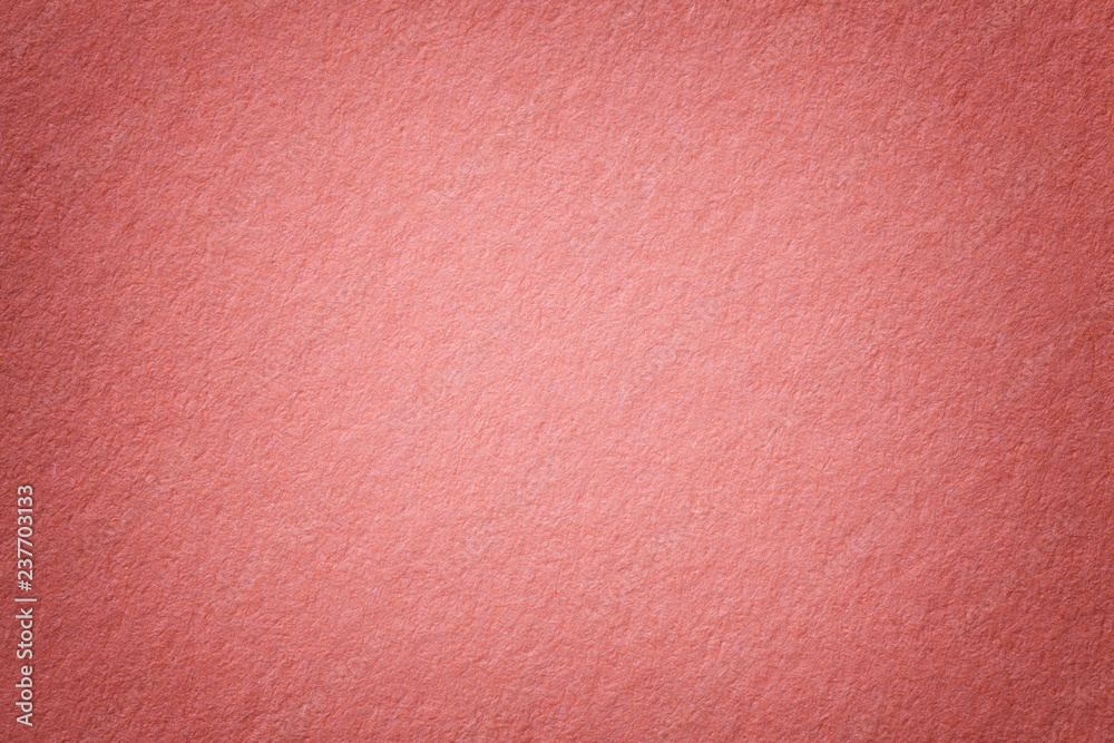 Texture of old dark pink paper background, closeup. Structure of dense cardboard. Texture of old dark pink paper background, closeup. Structure of dense cardboard.