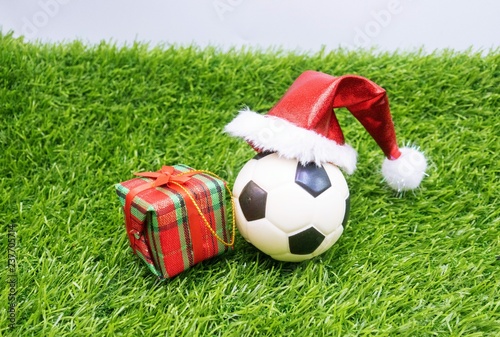 Football with Santa Hat Merry Christmas and Happy New Year to Soccer  © thaninee