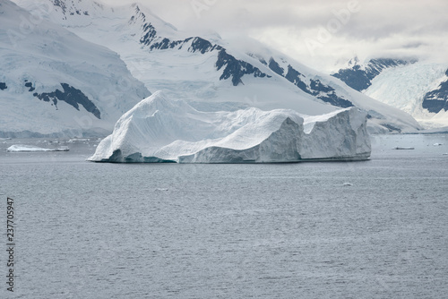 Large iceberg near the coastline of Paradise Bay  Antarctic Peninsula