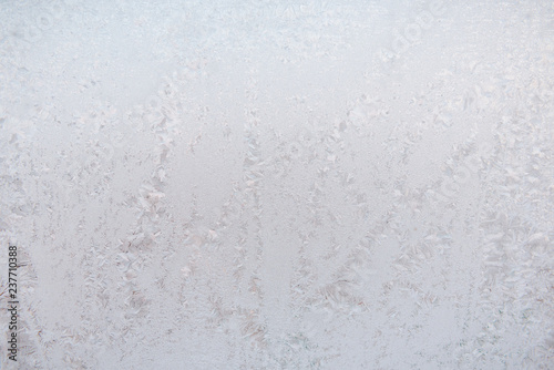 Background ice on the glass. Frost. The texture of frost. The glass is frozen.