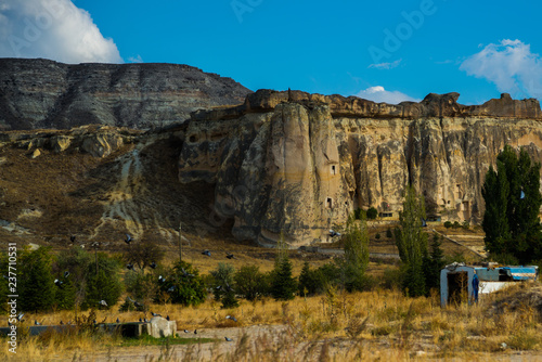 Church Nikifor Fokas, Nikeforos Fokas Kilisesi, also referred to as Pigeon, Guvercinlik, Cavusin Church. The ancient temple is located in the rock. Cappadocia, Anatolia, Turkey photo