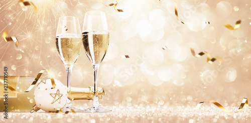 Photography New Years Eve Celebration Background with Champagne and Confetti