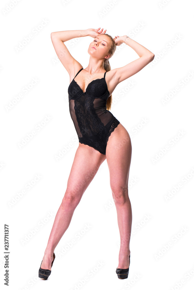 Young beautiful blonde woman in black bikini