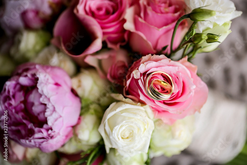 Close up with beautiful flowers and rings