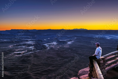Tourist at the Green River Overlook in Canyonlands National Park