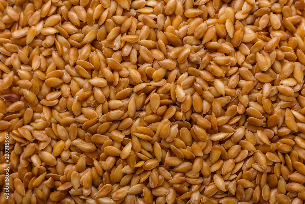 Seeds of golden flax on a white background Seeds of golden flax on a white background