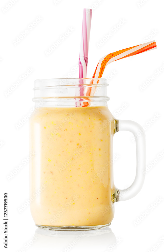 Banana or vanilla smoothie or yogurt in mason jar with straws Banana or vanilla smoothie or yogurt in mason jar with straws