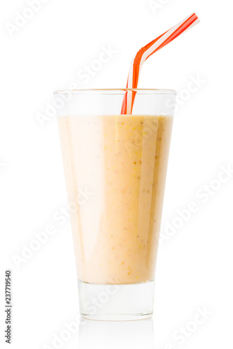 Banana or vanilla smoothie or yogurt in tall glass with straw