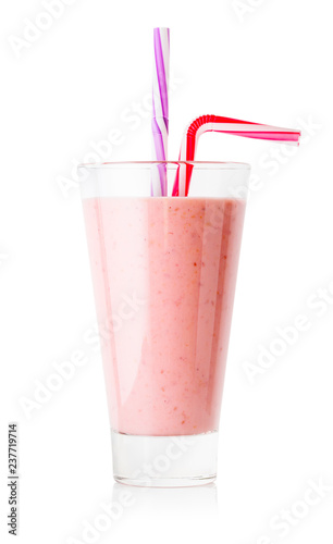 Berry smoothie or yogurt in tall glass with two striped straw