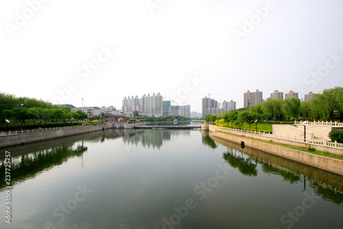 City architecture at the water's edge © junrong
