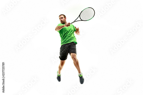 The one caucasian man playing tennis isolated on white background. Studio shot of fit young player at studio in motion or movement during sport game.. © master1305
