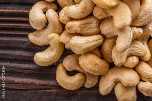 cashew nuts on a rustic wooden background