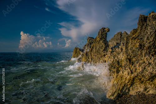 wild sea shore landscape waves breaking on rocks