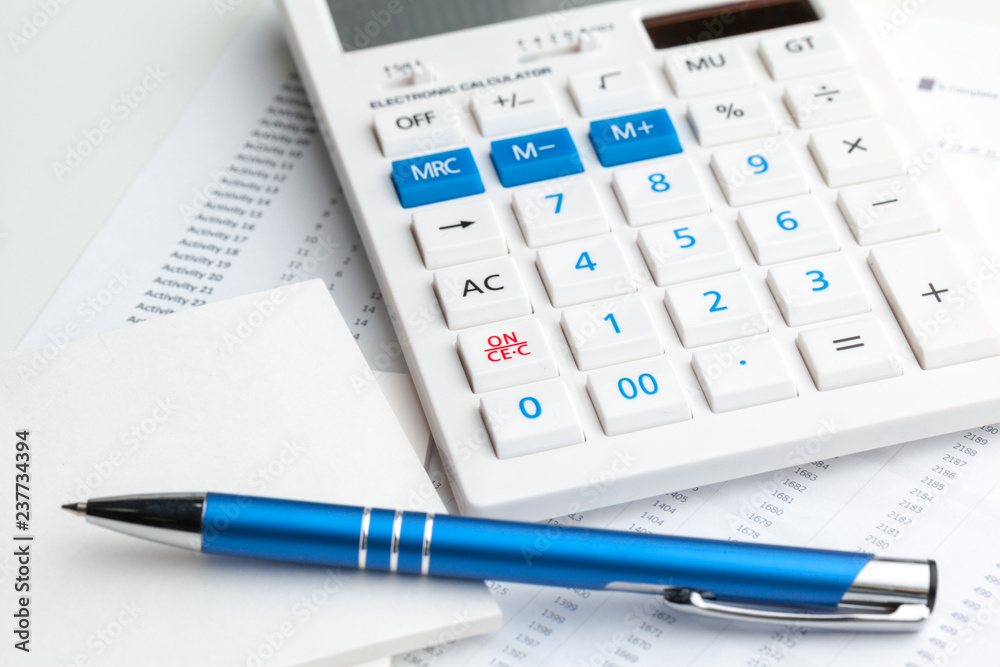 Business still life with calculator on table in office. Business still life with calculator on table in office.