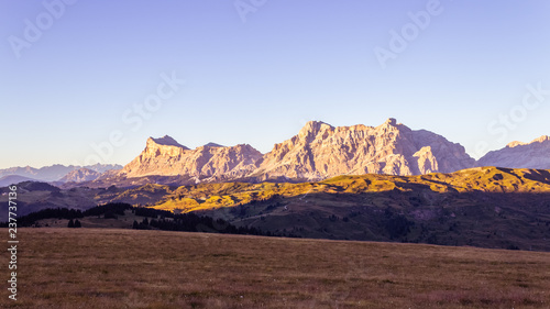 Mountains of Fanes Group at sunset: Sas dles Diesc (Cima Dieci), Sas dla Crusc (Monte Cavallo), Lavarella and Piz dles Cunturines (Cima Cunturines) viewed from Cherz, Alta Badia, Dolomites, Italy