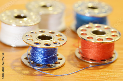 Coil with a sewing thread.