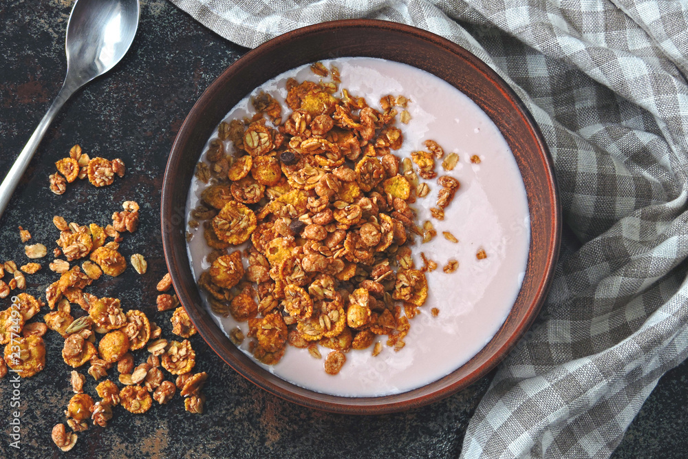 Fototapeta premium Breakfast bowl with yogurt and granola. Beautiful healthy food. Superfoods.