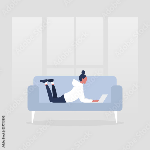 Young female manager lying on the sofa with the laptop. Modern office. Freelance. Daily routine. Millennial lifestyle. Flat editable vector illustration, clip art