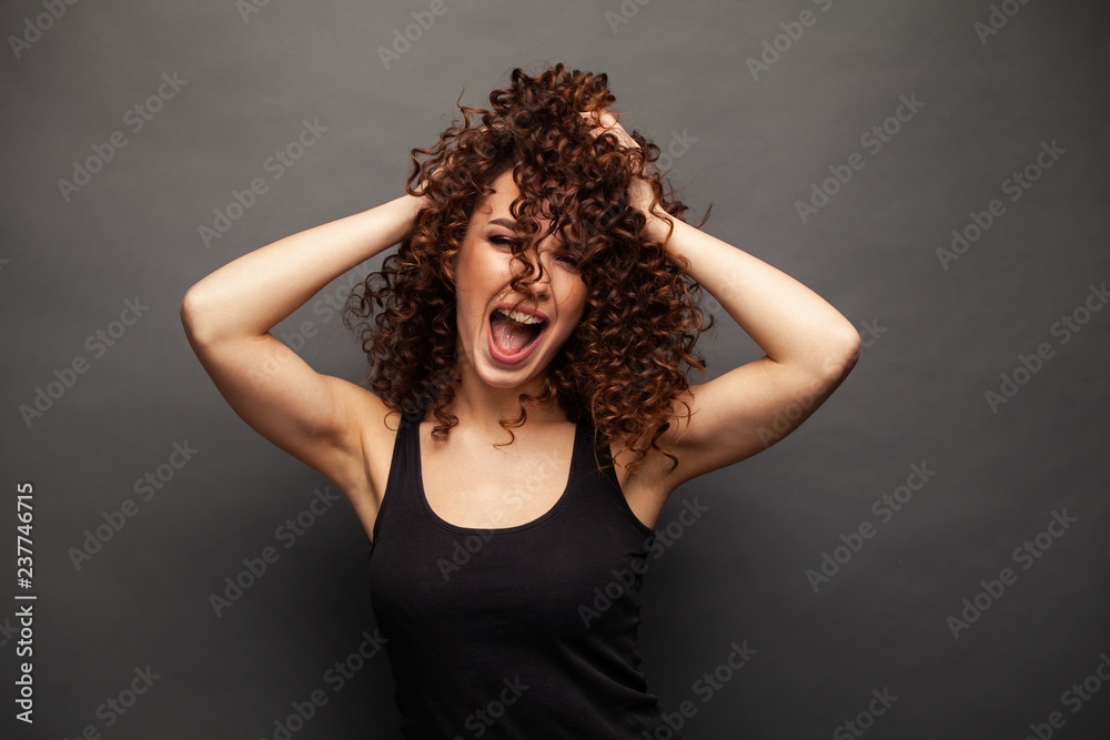 people, style and fashion concept - happy young woman or teen girl in casual clothes having fun. people, style and fashion concept - happy young woman or teen girl in casual clothes having fun.