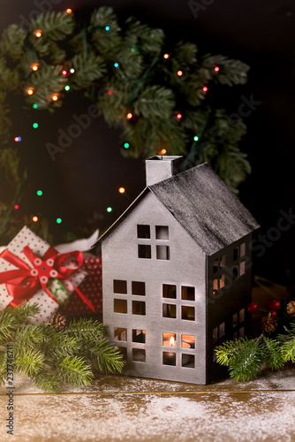 Christmas Toy House Snowing Wooden Background Concept of Winter Holiday Card or Concept New Year Warm and Cozy Christmas House Vertical