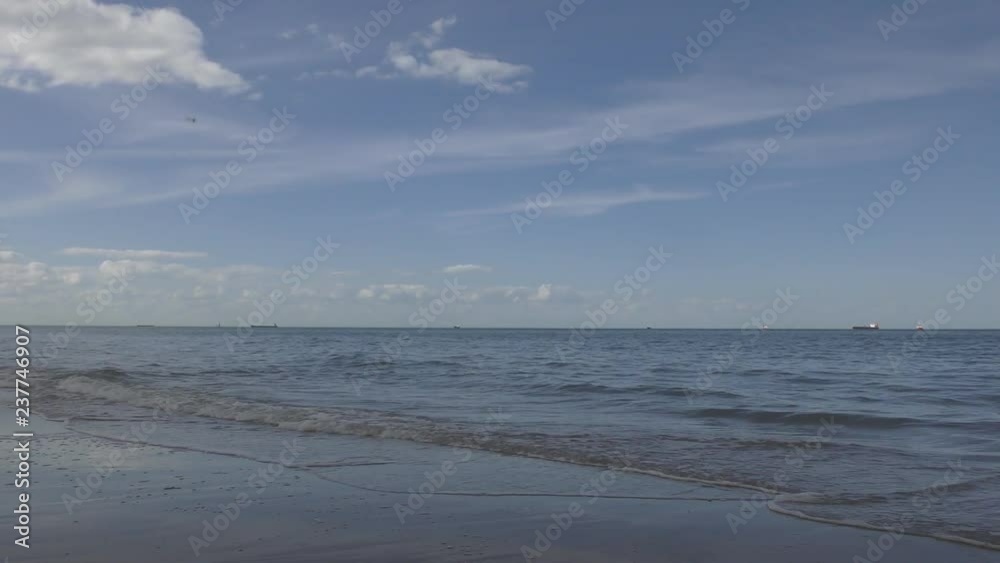 Quite ocean waves on the sandy beach. Britain. Quite ocean waves on the sandy beach. Britain.