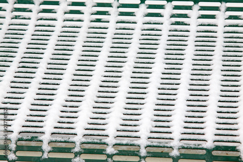 Metal net cover in snow