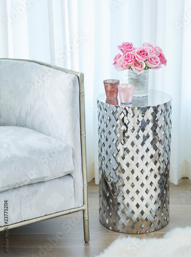 Bouquet of pink roses on modern metal table
