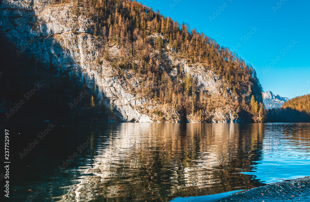 Beautiful autumn reflections at the famous Koenigssee-Bavaria-Germany