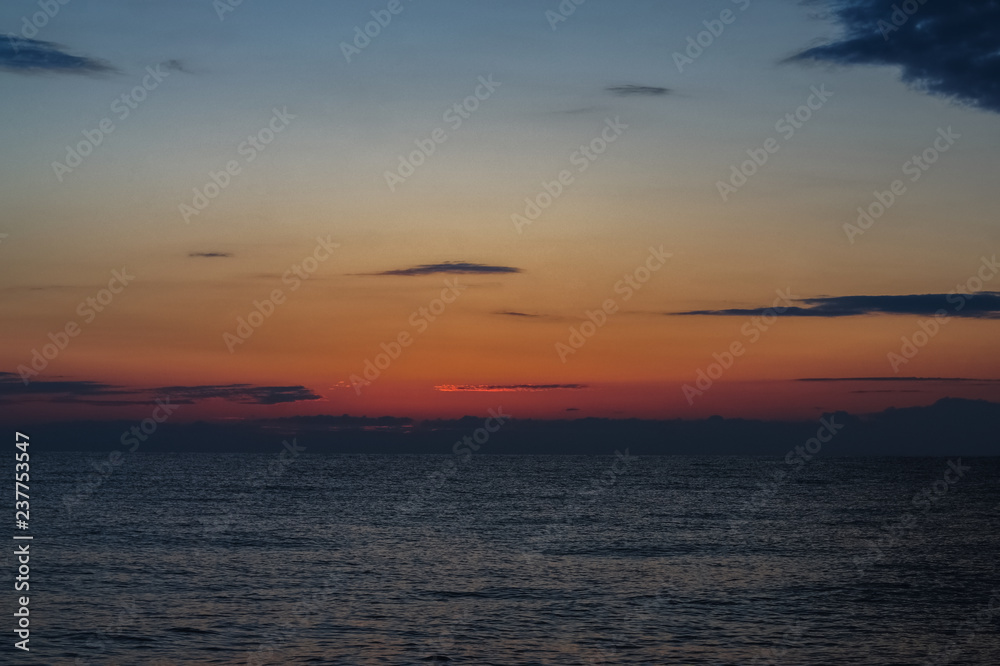 Morning sunrise on the horizon of Aegean sea.