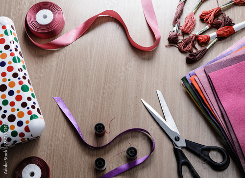 Everything for handmade on the wooden table.