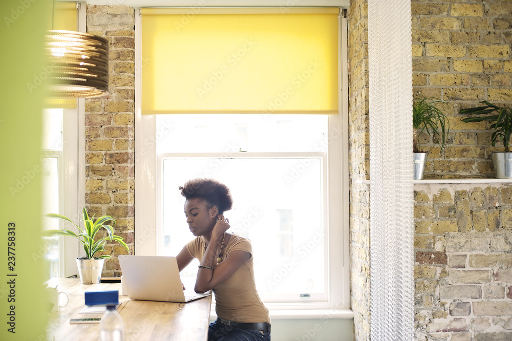 Young professional black female office worker Young professional black female office worker