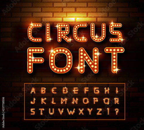 Circus marquee fonts on brick wall background. Vector