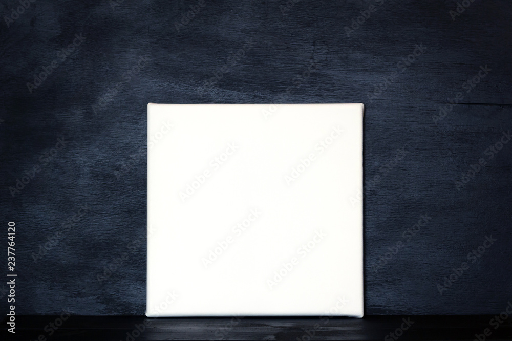 Blank canvas on black background. Mockup poster. Blank canvas on black background. Mockup poster.