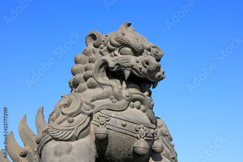 giant lion sculptures under blue sky, tangshan city, China