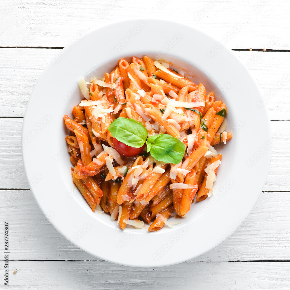 Stockfoto Pasta Pene with Bacon and Cherry Tomatoes. Italian dish Free  space for your text. Top view. | Adobe Stock