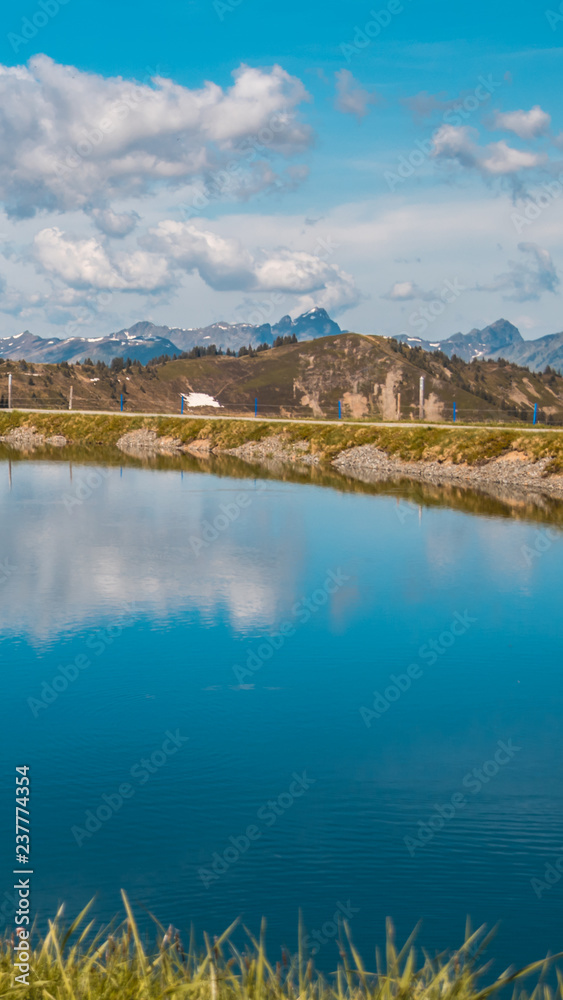 Smartphone HD wallpaper of beautiful alpine view with reflections at Leogang - Tyrol - Austria
