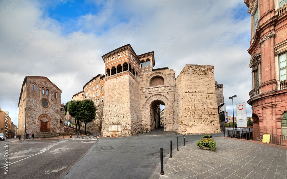 Perugia, Italy. View of Etruscan Arch or Augustus Gate (Arco Etrusco o di Augusto) - one of gates in the Etruscan wall of the city constructed in the 3rd century BC