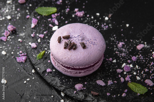 French Colorful Macarons on Black Background Horizontal Close Up