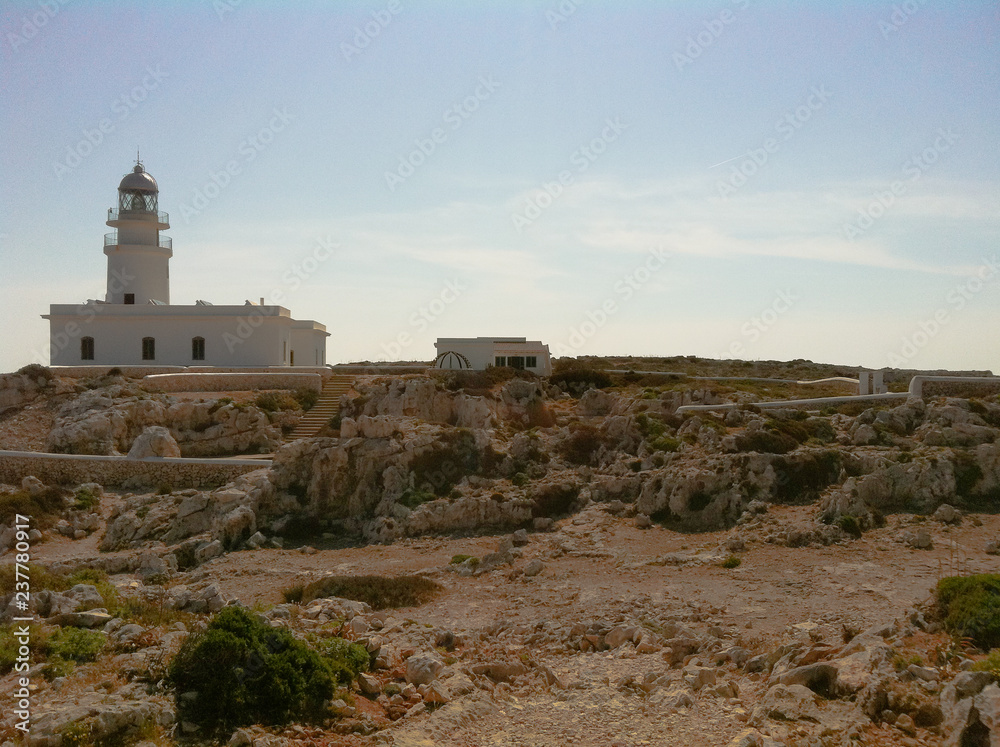 South Light House along the coast in white color and blue sky background