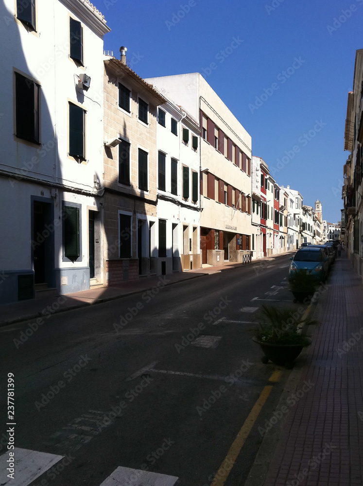 Typical mediteran city view along houses during summer time