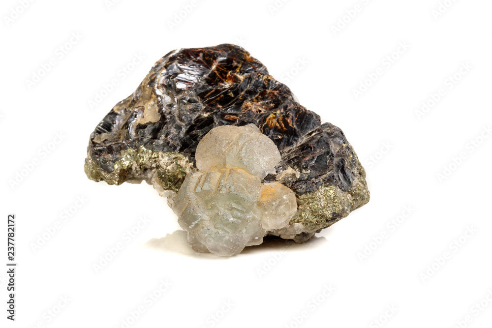 Macro of a mineral stone Sphalerite with fluorite and pyrite on a white background