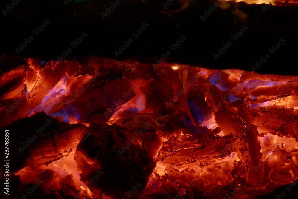 smoldering coal with blue fire smoldering coal with blue fire