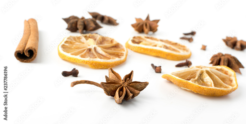 Fototapeta premium Dry spices for mulled wine isolated on white