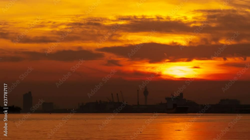 Time lapse shot of beautiful sunrise on the river with cargo ship
Time lapse shot of beautiful sunrise on the river with cargo ship